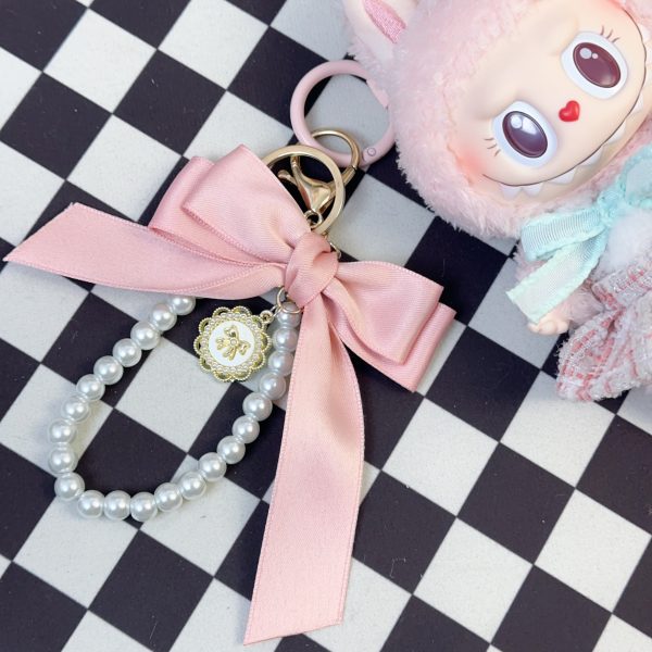 4_bb46523c-95aa-4e88-90d6-6cd1015fcc2c.jpg Bow Key Chain + Pink skirt|toys accessories plush toys Pink components 1 pink dress and keychain